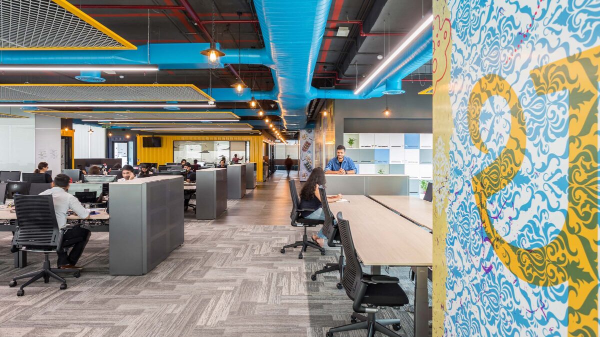 people working in open plan office