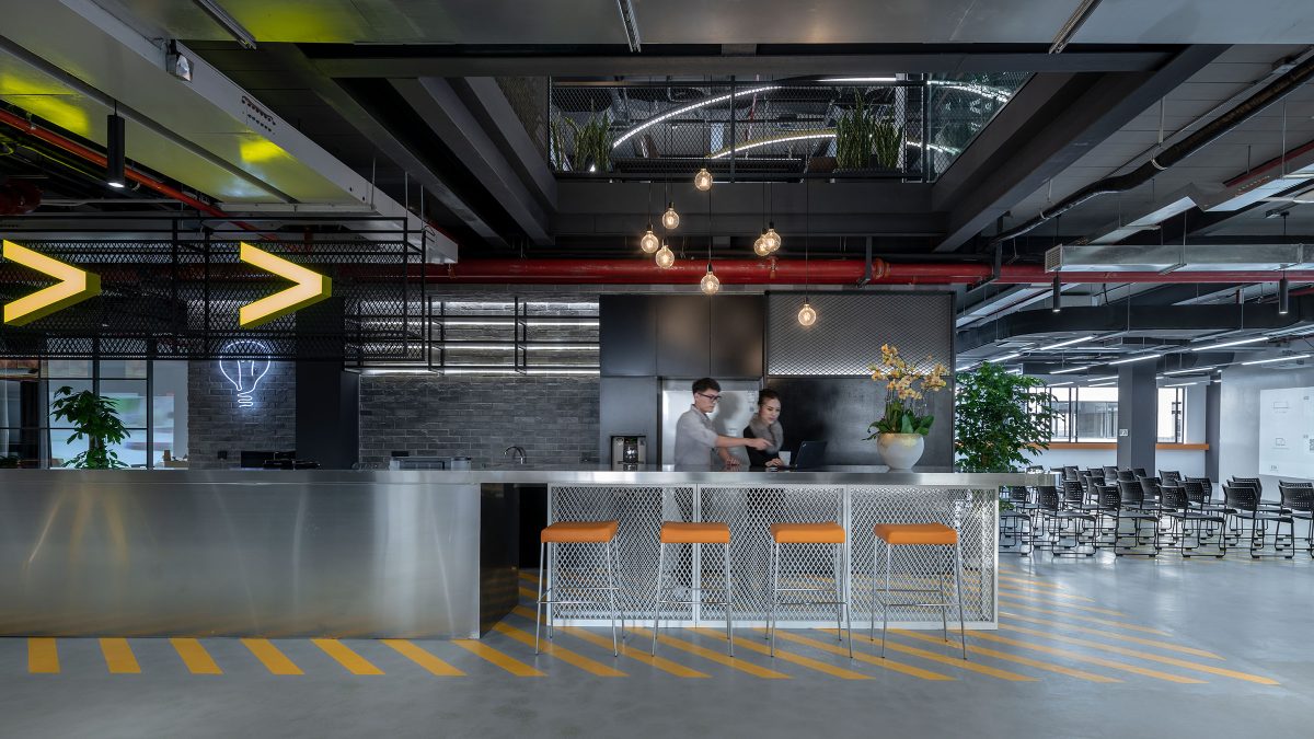 people collaborating near kitchen area