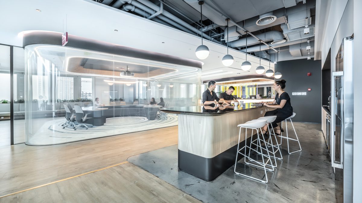 people collaborating and view of meeting room