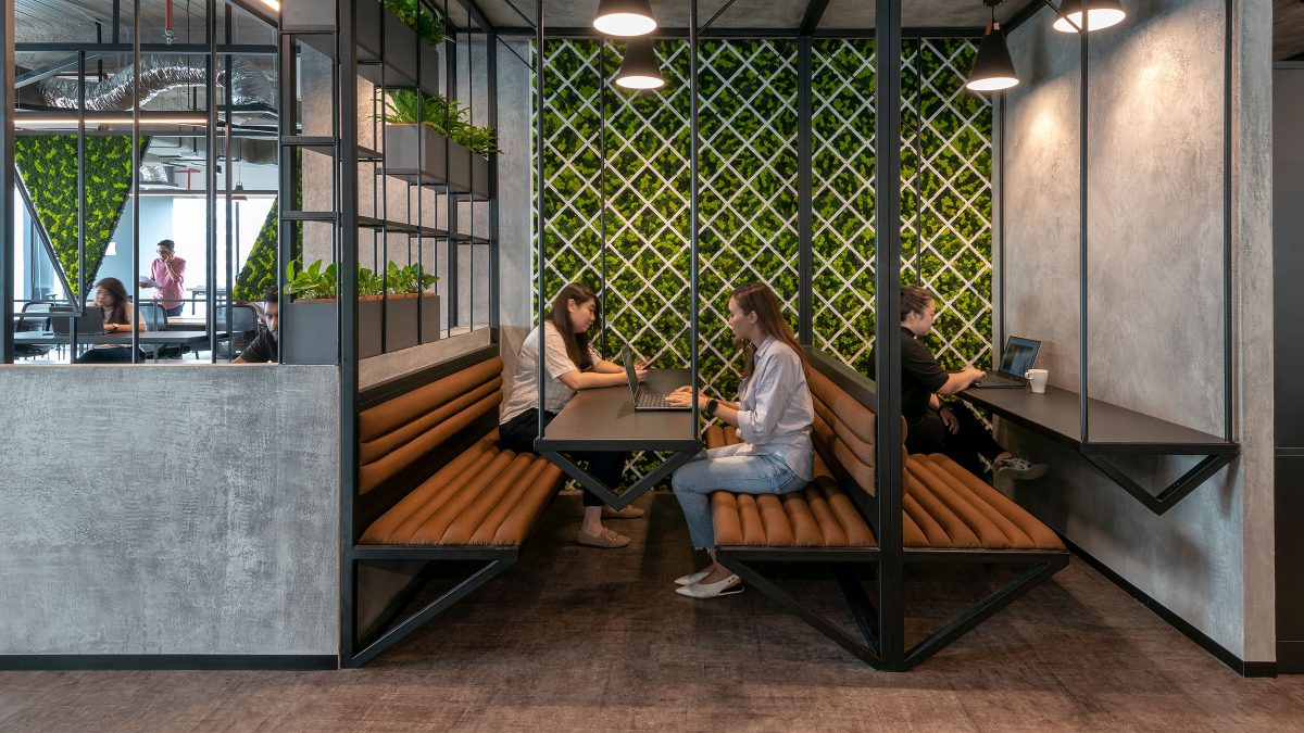 People working in booths