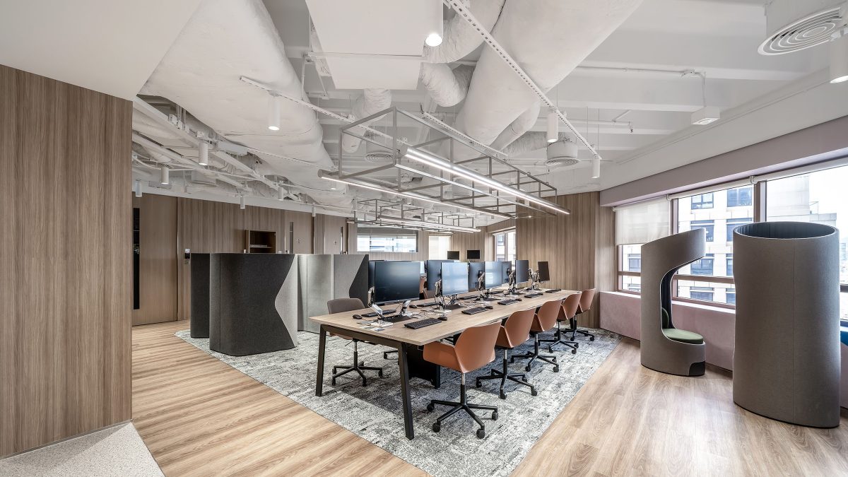 Open plan office with single booths