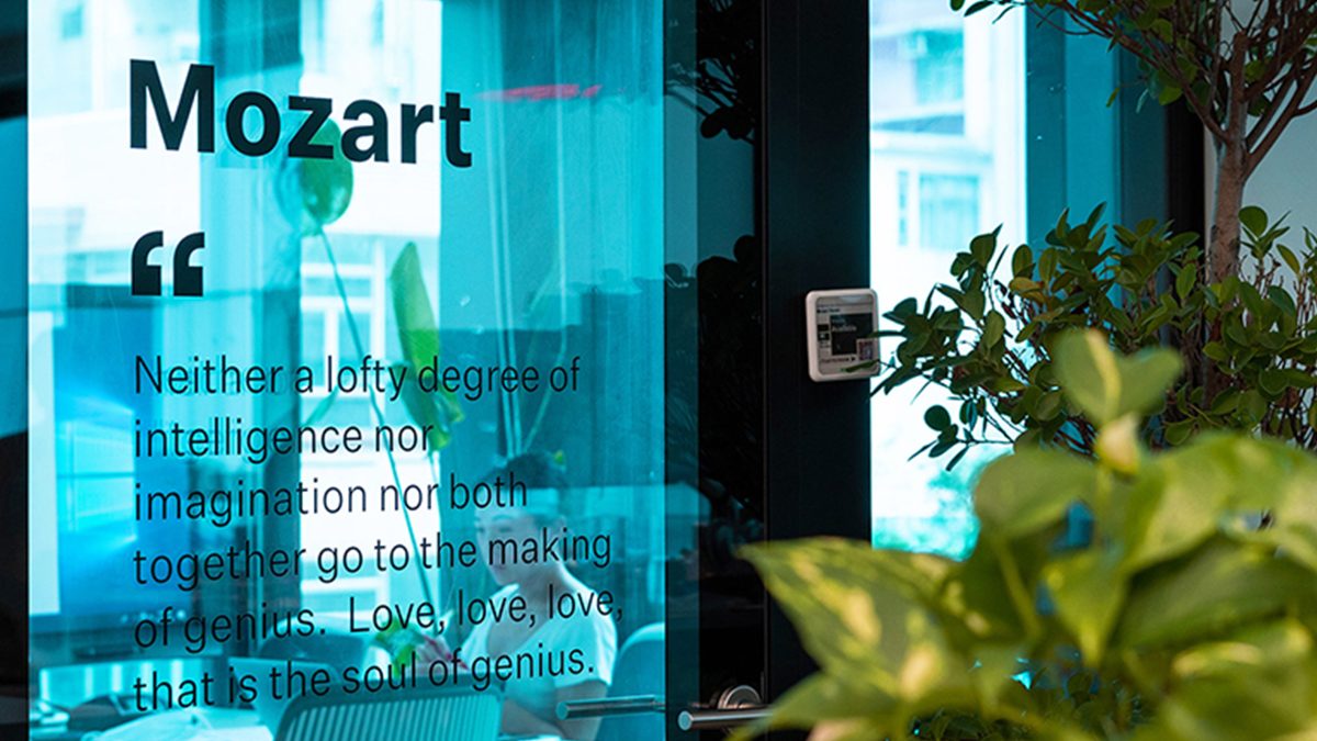 quote on glass window at M Moser office