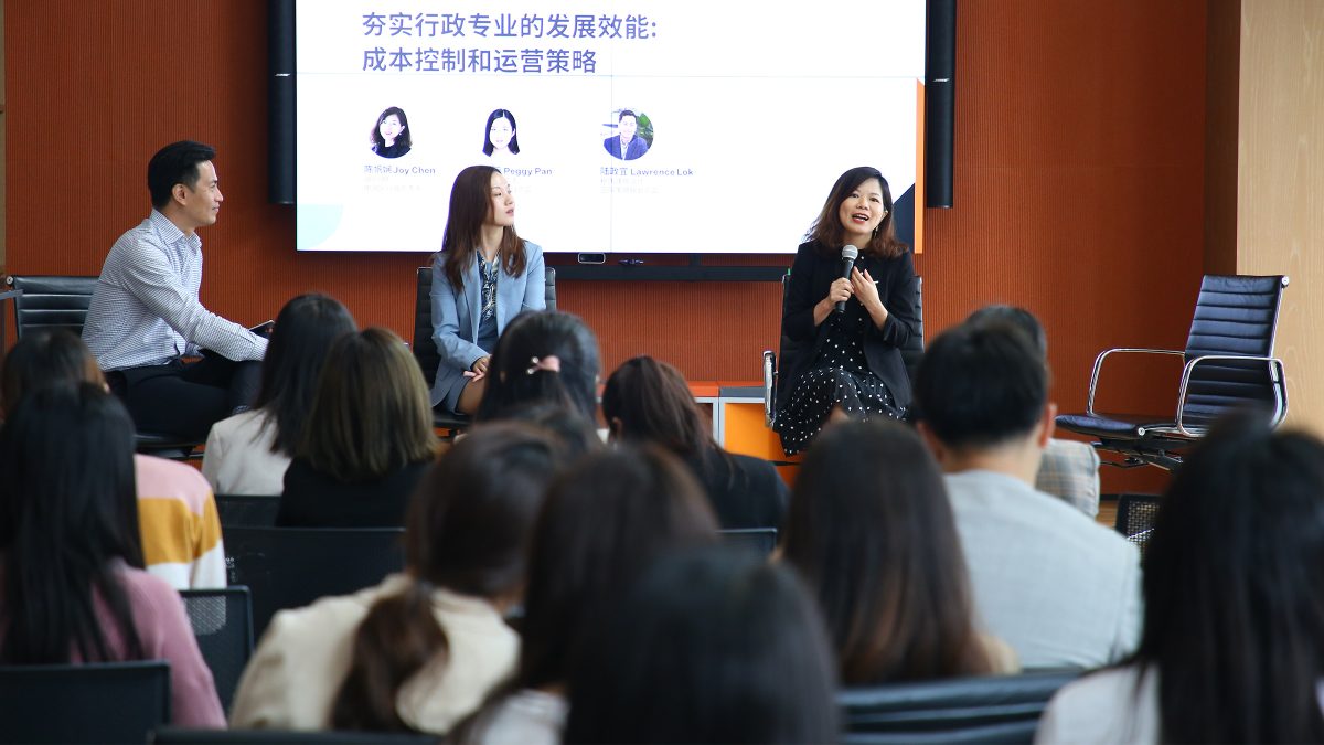 Speakers having discussion at the ZhiXingXiaoZheng office workshop event