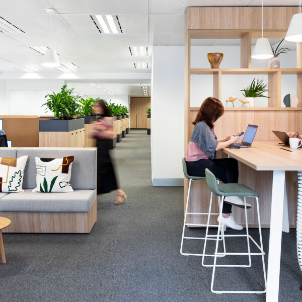 people working at high tables