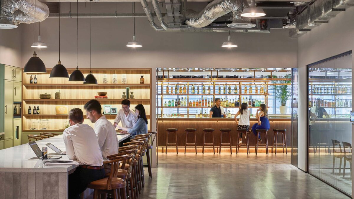 people sitting around workplace bar