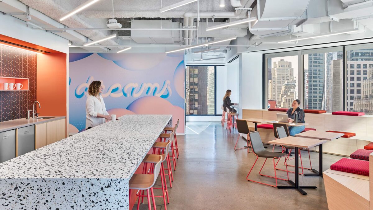 people working in open plan workplace