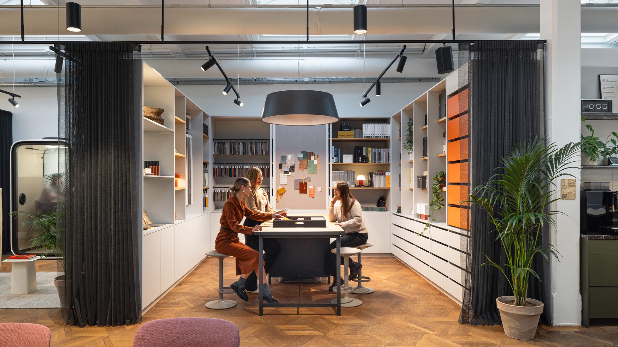 people-collaborating-in-material-sample-library-at-M-Moser-Amsterdam-studio